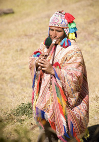 Peru Musician playing the flute.